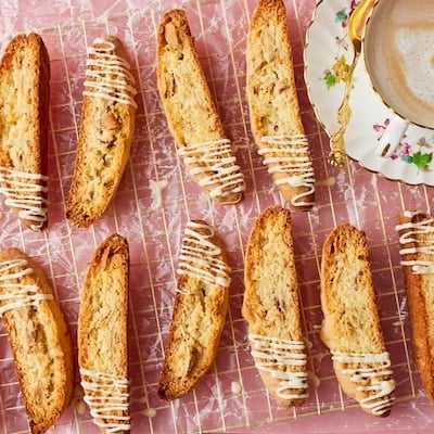 Top-down view of Lemon Biscotti on the cooling rack, served with tea.