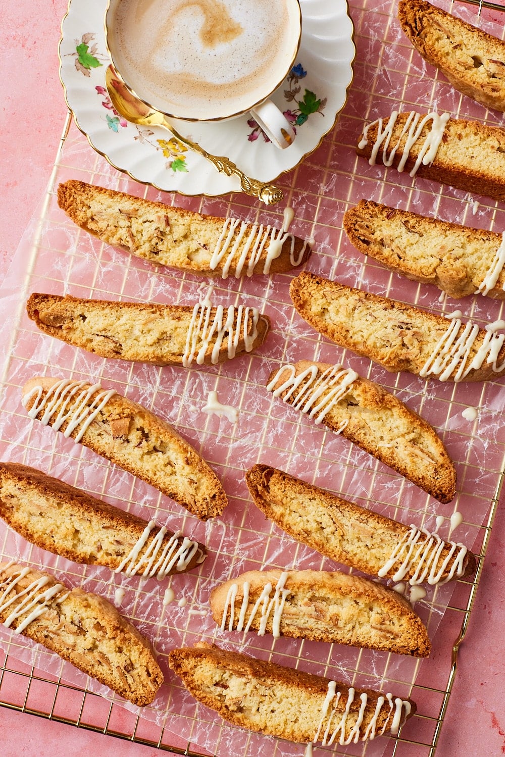 Top-down view of Lemon Biscotti on the cooling rack, served with tea. 