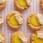 A top-down view of lemon meringue pie cookies with golden crust, silky filling and toasted marshmallows.