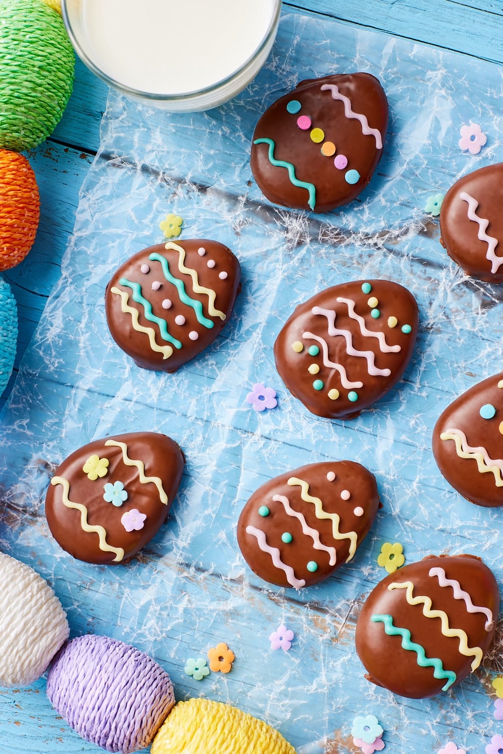 Peanut butter eggs10 Top-down view of peanut butter eggs decorated with melted candy melts.