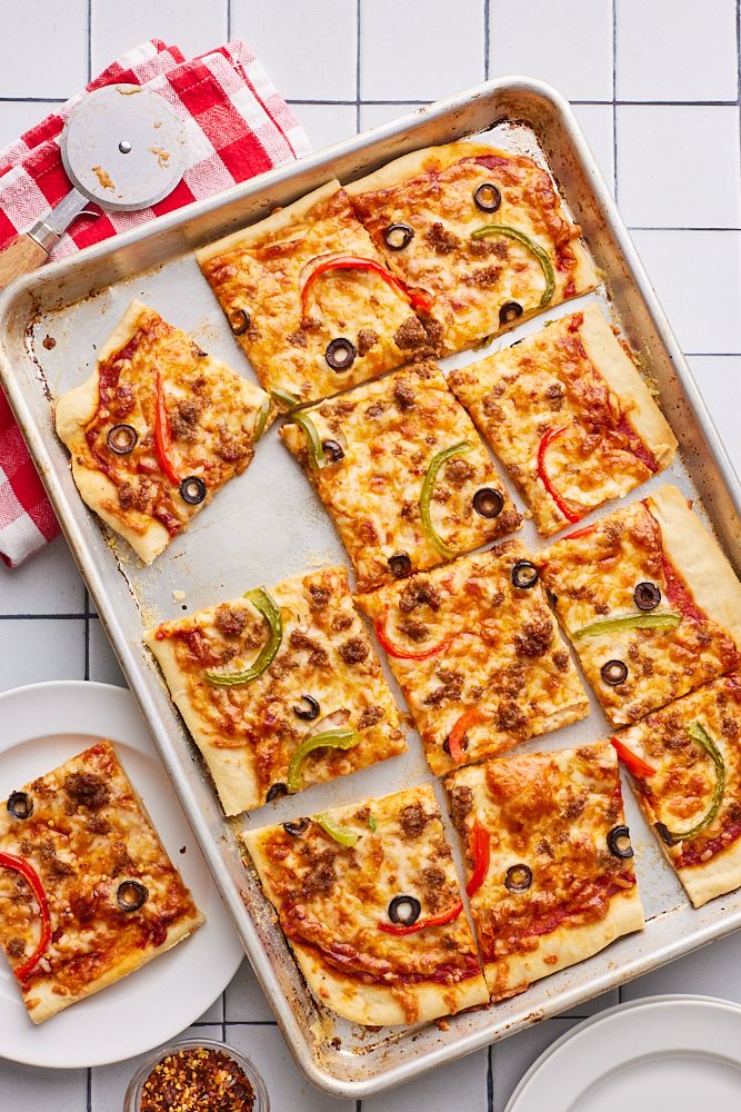 Sheet Pan Pizza9 Sheet Pan Pizza sliced into squares.