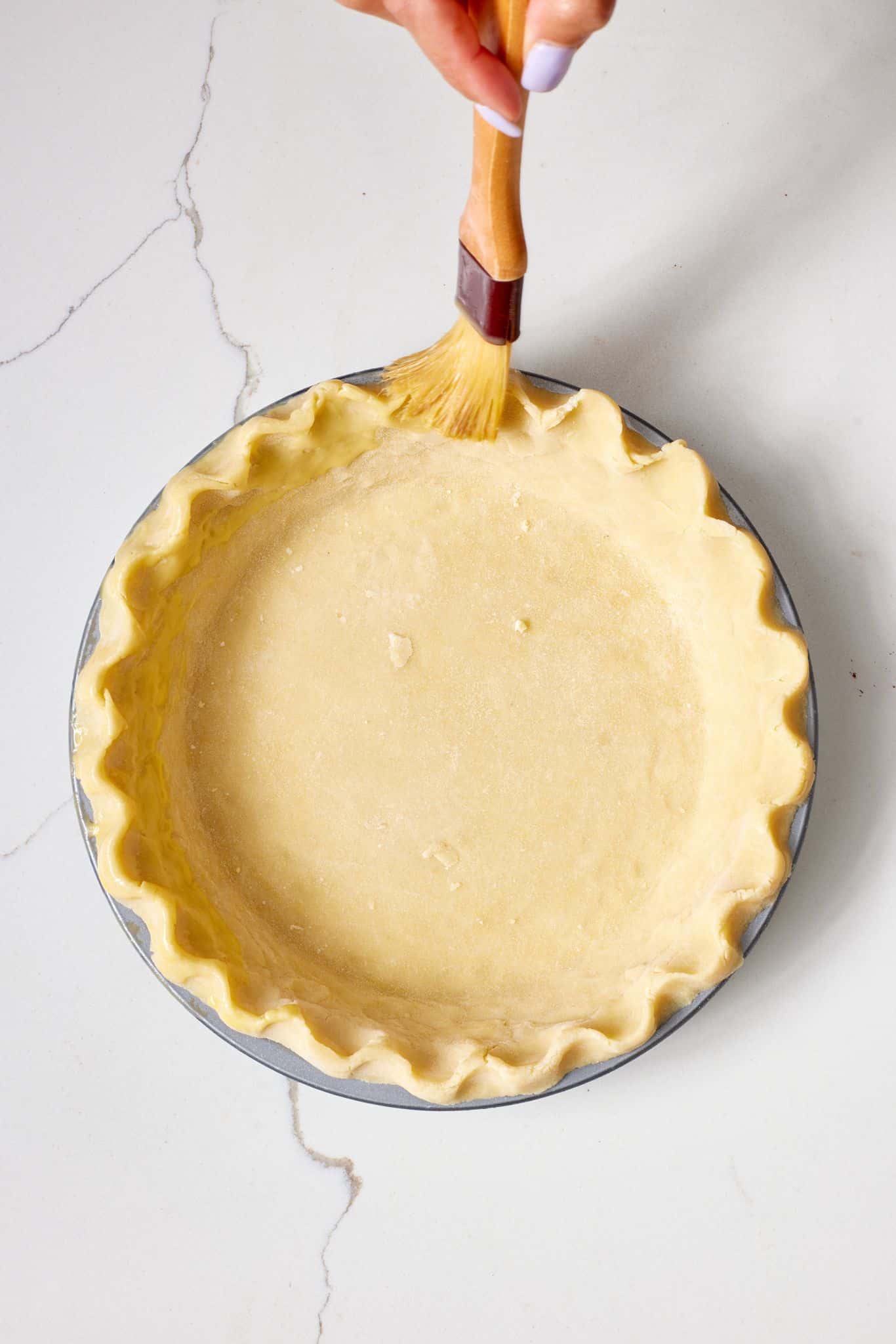 Asparagus and ham quiche3 Apple egg wash onto the pie crust.