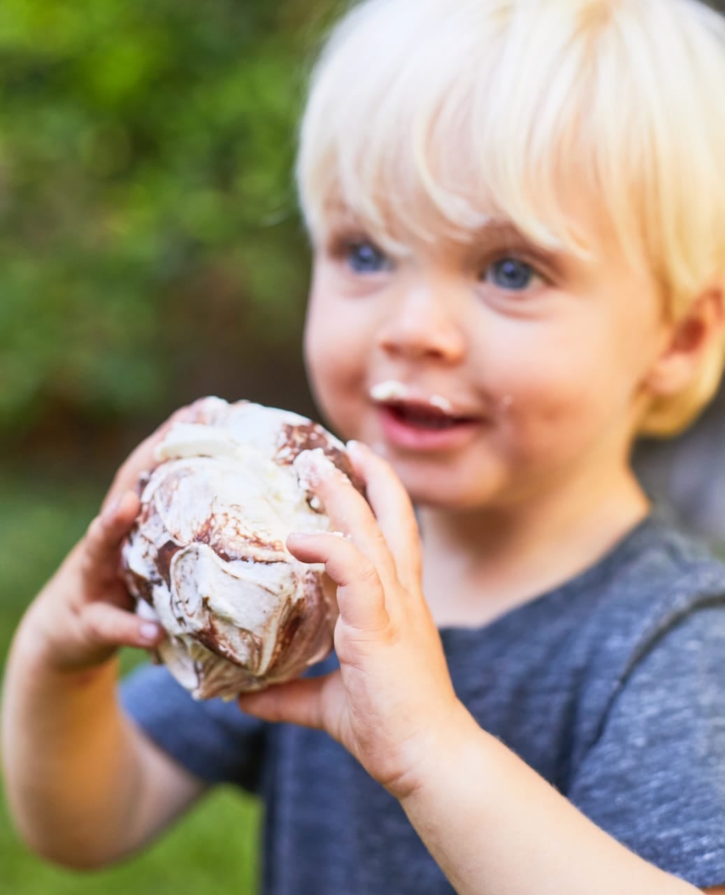 A young boy with a Cocoa Swirl Meringue