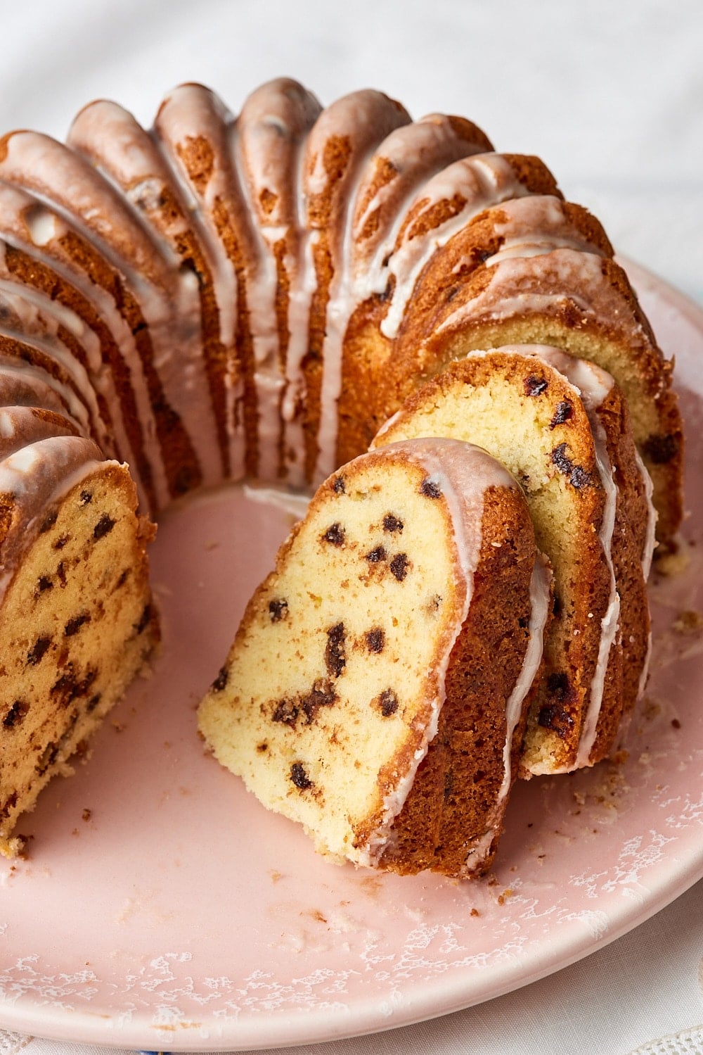 Chocolate Chip Pound Cake12 Side view of the chocolate chip pound cake with part of it sliced