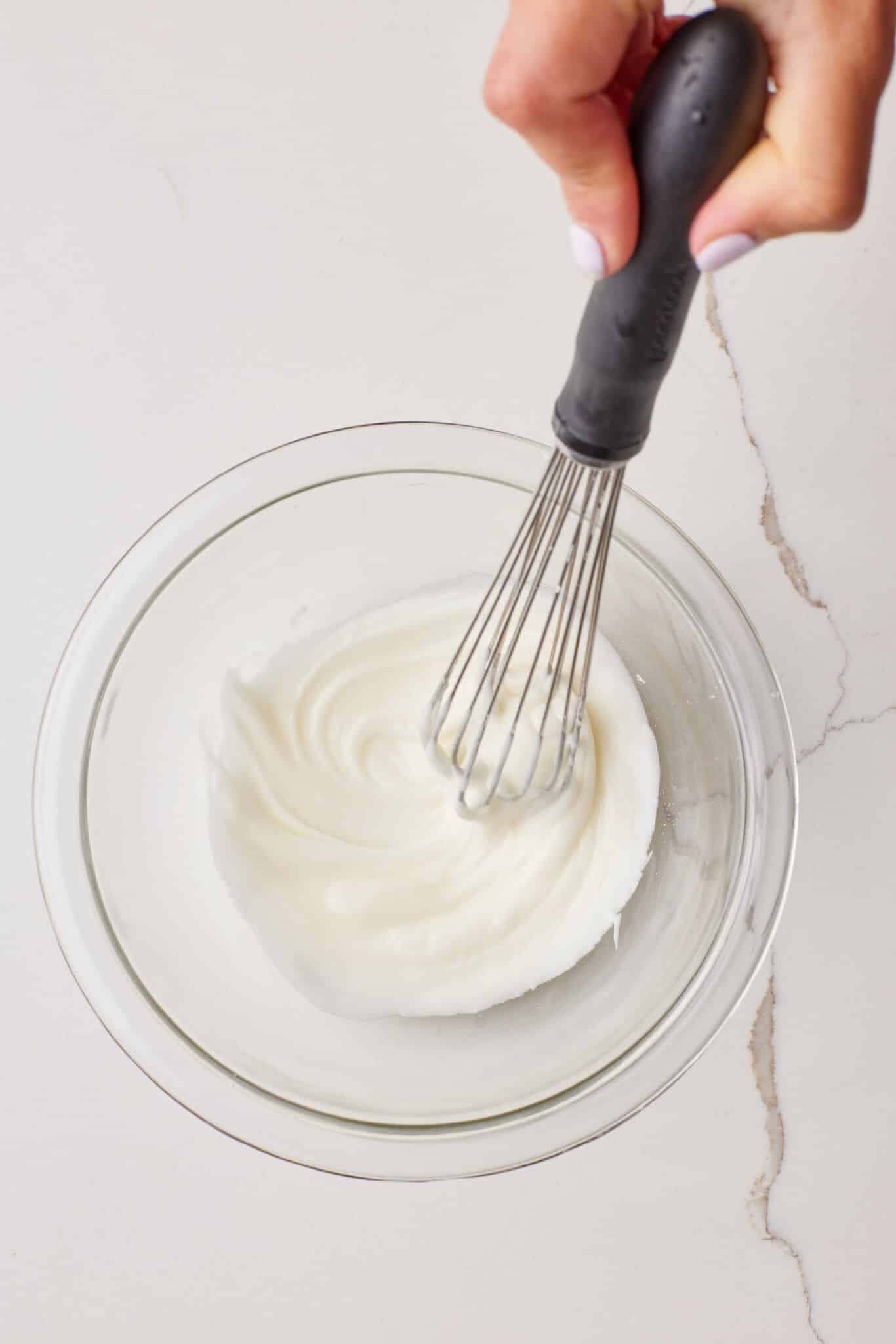 Chocolate Chip Pound Cake9 Whisk glaze in a bowl for chocolate chip pound cake.