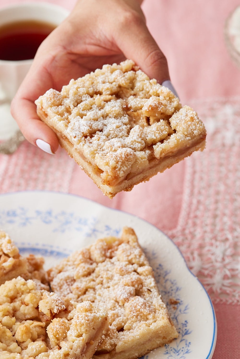 A close-up shot at a square of Apple Crumble Bar. 