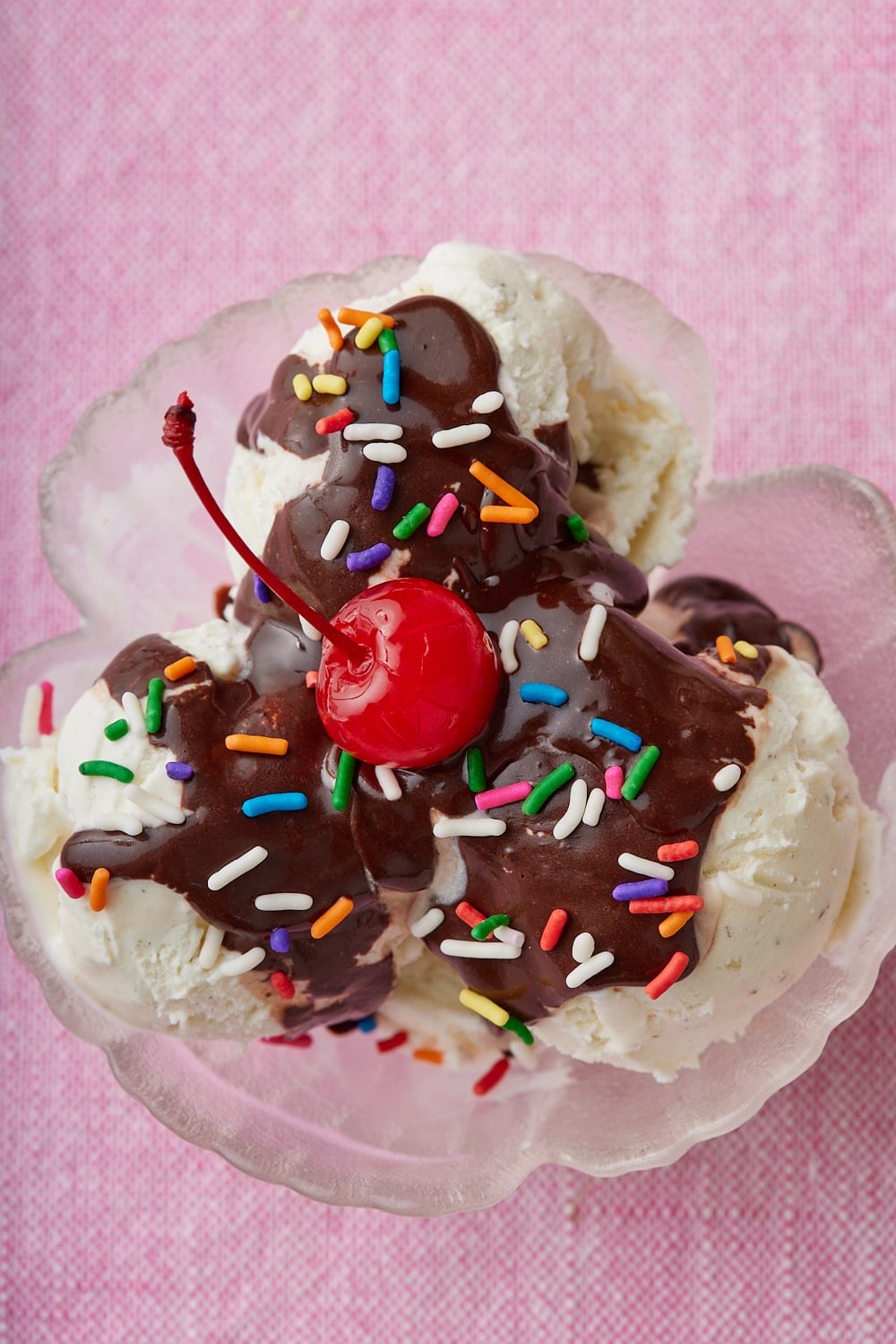 Hot Fudge Sauce5 Hot Fudge Sauce served over ice cream with sprinkles.