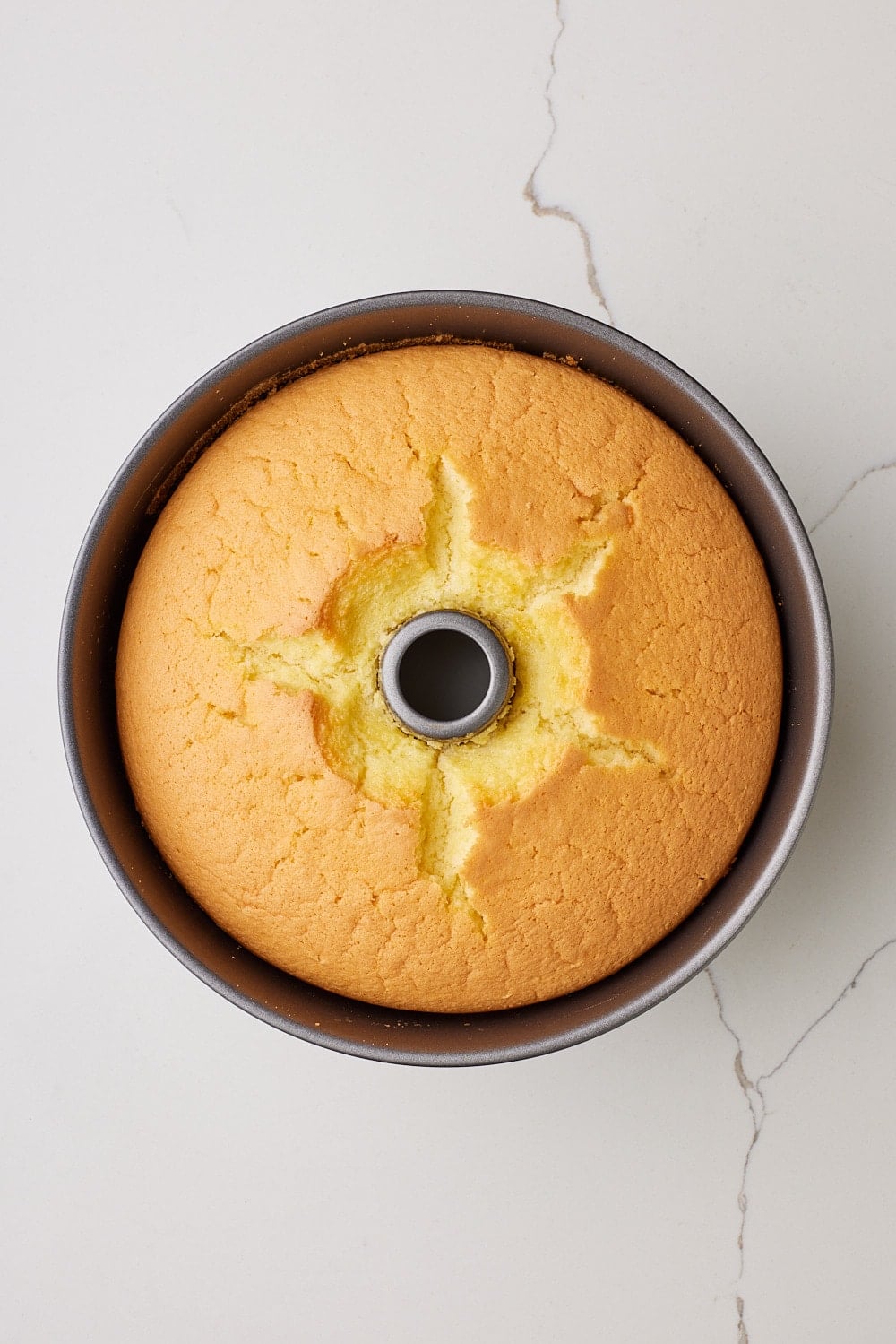 until the top is golden brown and a tester or toothpick inserted into the center comes out clean.