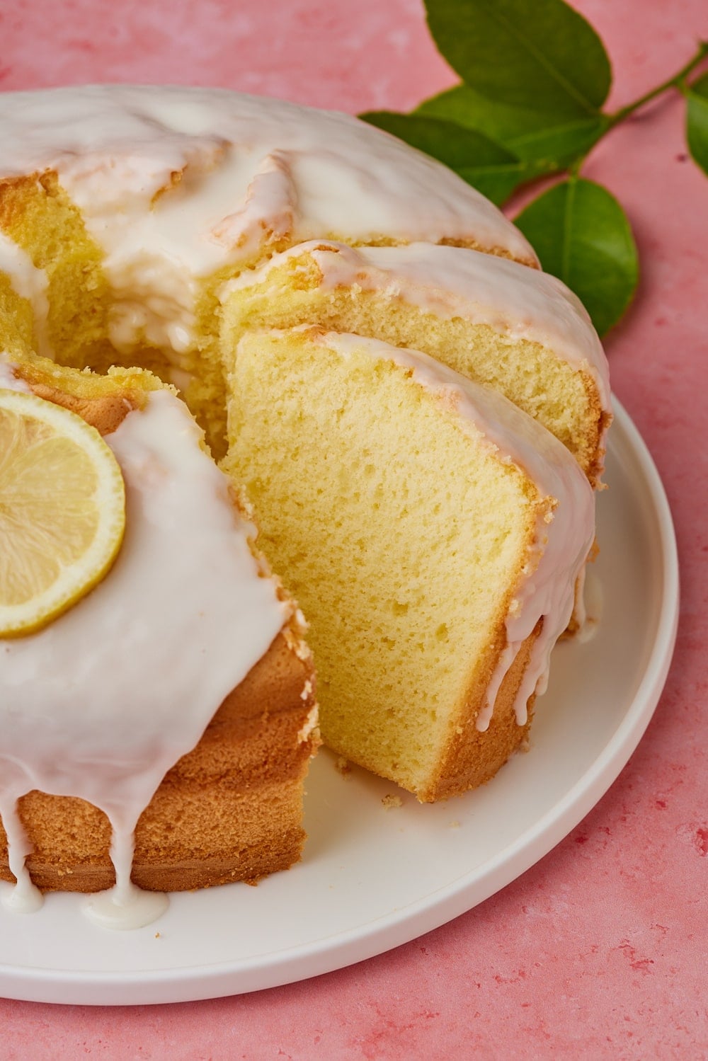 A lemon chiffon cake drizzled with glaze.