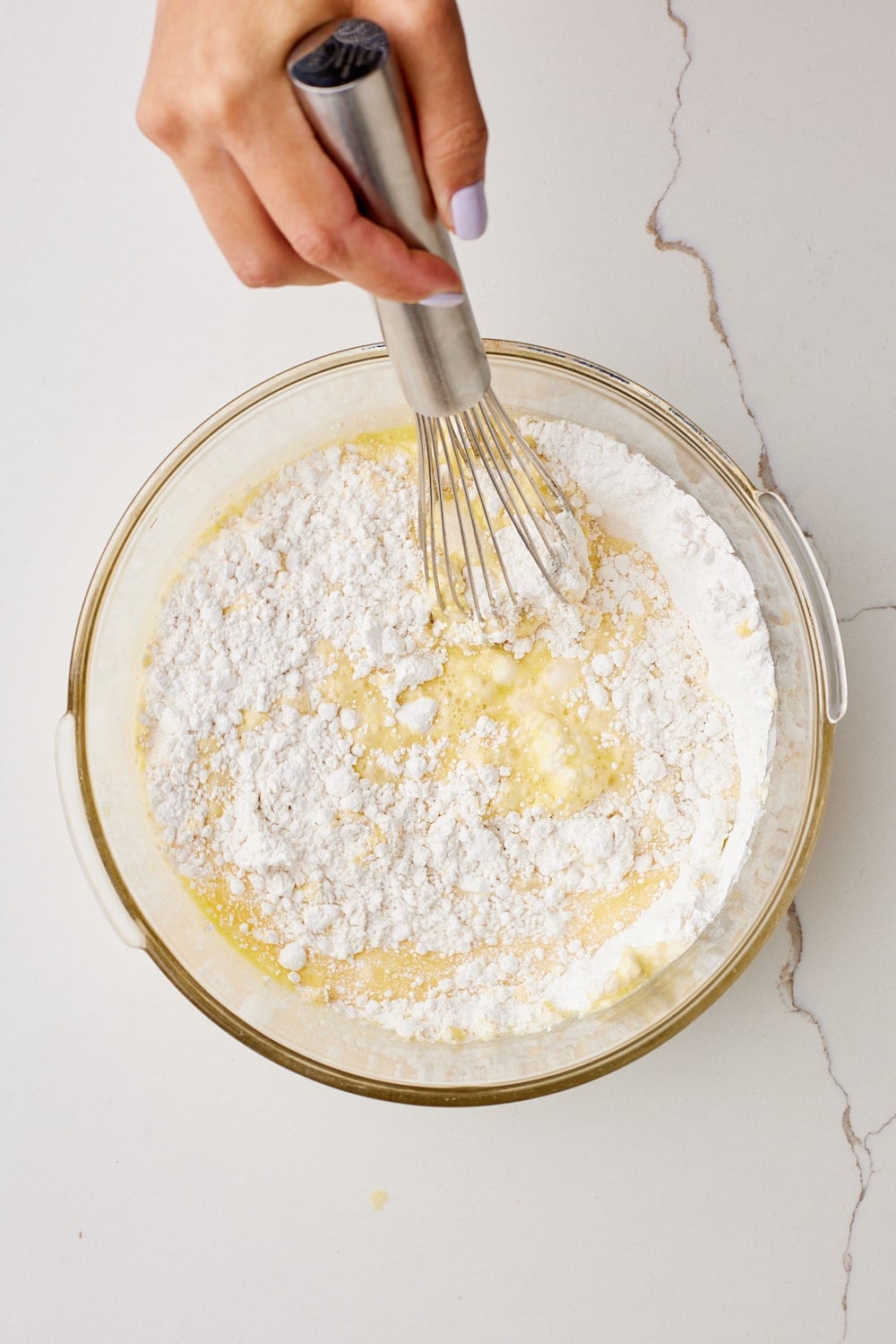 Pour the wet ingredients into the flour mixture and stir until smooth. Set aside.