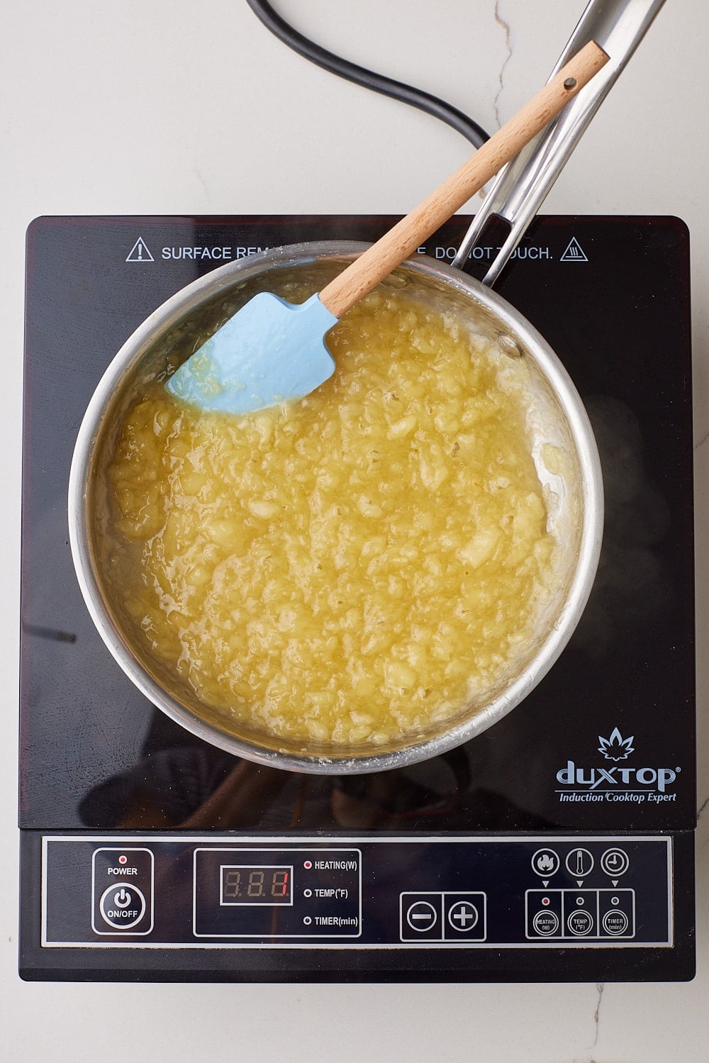 Pineapple Coconut Cake11 Cook pineapple filling until glossy .