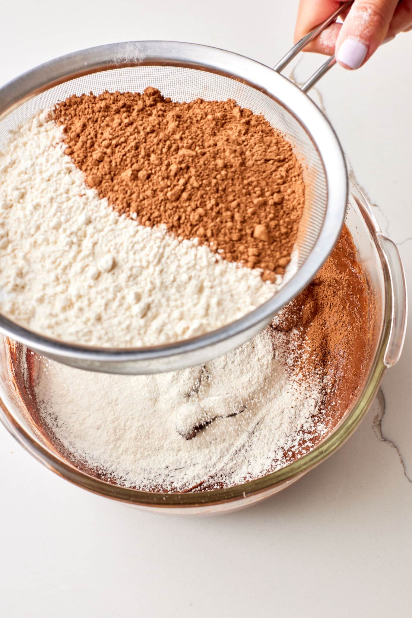 Sift together the flour and cocoa powder into a medium bowl.