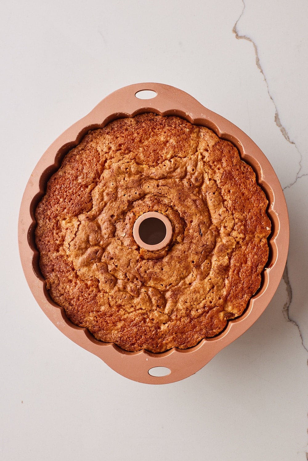 Bake Strawberry Lemon Pound Cake until golden brown on top. 