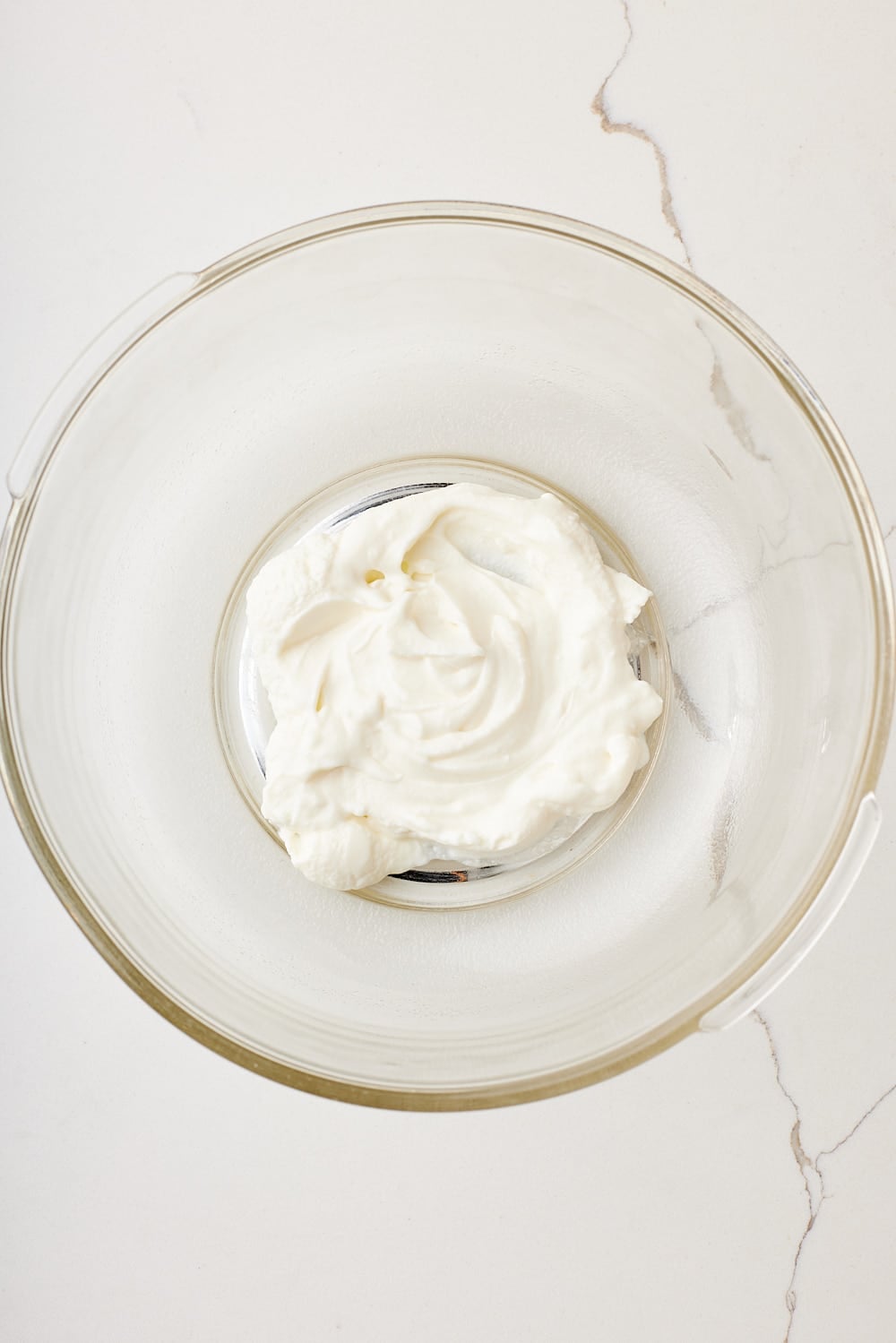 Yogurt for French Yogurt Cake in a bowl. 