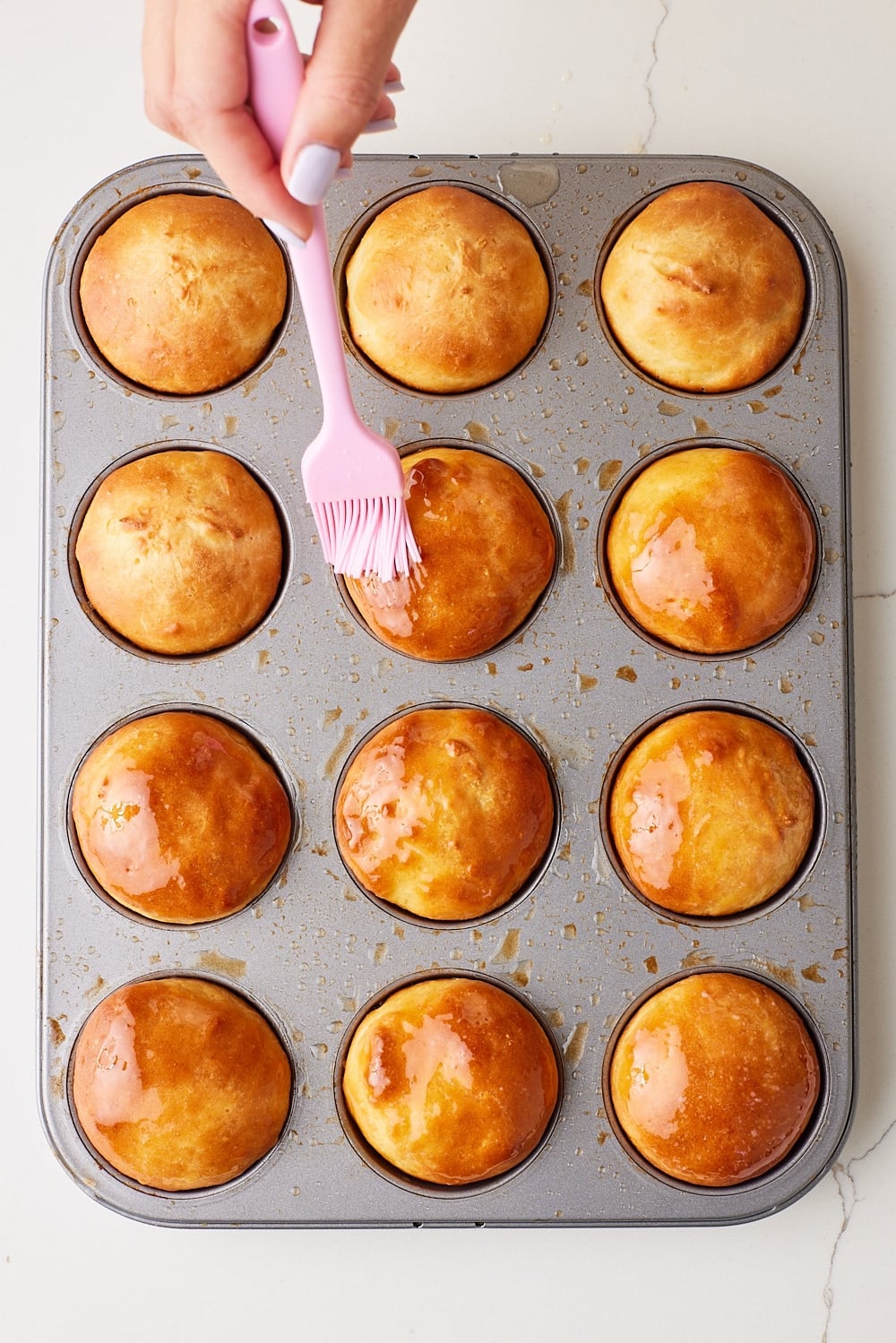 Sally Lunn Buns11 Brush butter on baked golden buns.