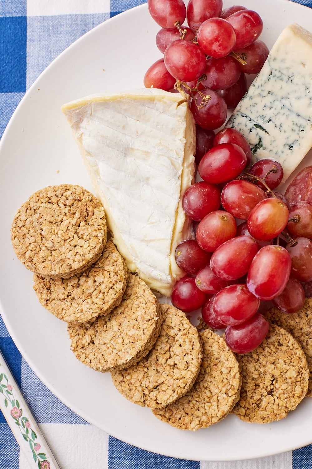 Scottish Oat Cakes9 Top-down view of Scottish Oat Cakes served with cheese and grapes.