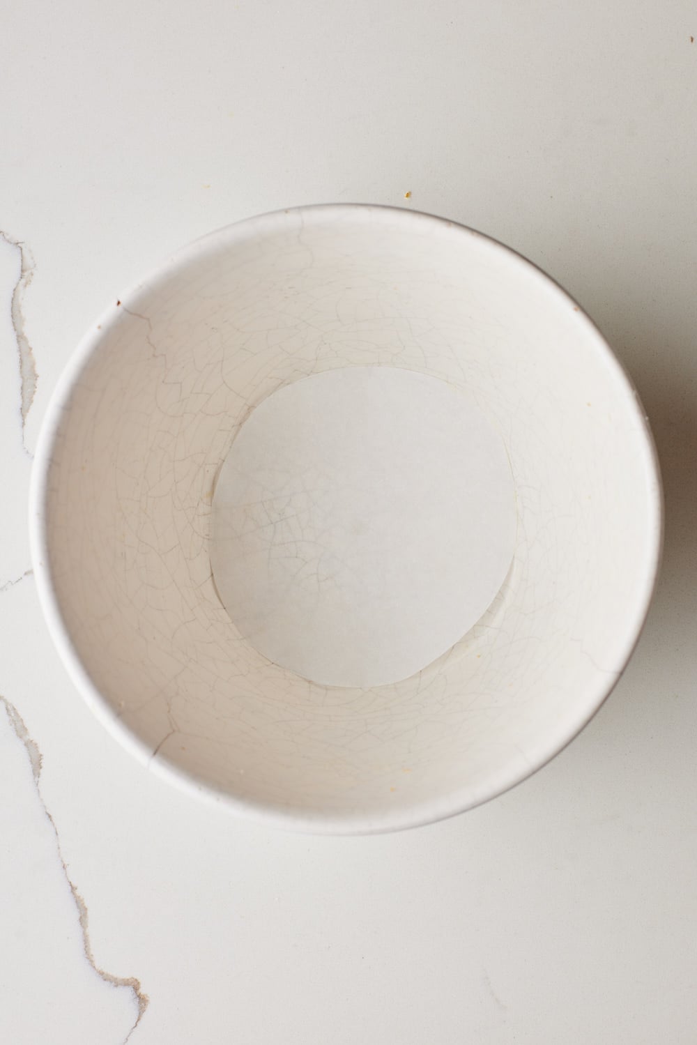 Spotted Dick2 Cover basin. Place a circle of parchment paper over the dough